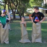 Kids Playing Sack Race 3 — Caravan Park in Kinka Beach, QLD