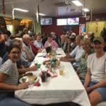 Group celebrating Christmas in July — Caravan Park in Kinka Beach, QLD