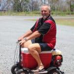 Man In A Mini BIke — Caravan Park in Kinka Beach, QLD